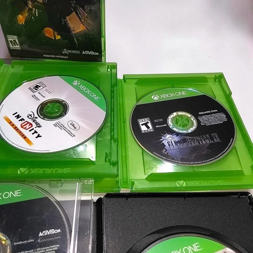 Microsoft Xbox One Video Game Lot Bundle 7 Discs COD Black Ops IV WWII Fallout 4